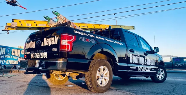 Sina's Roofing & Repair service truck